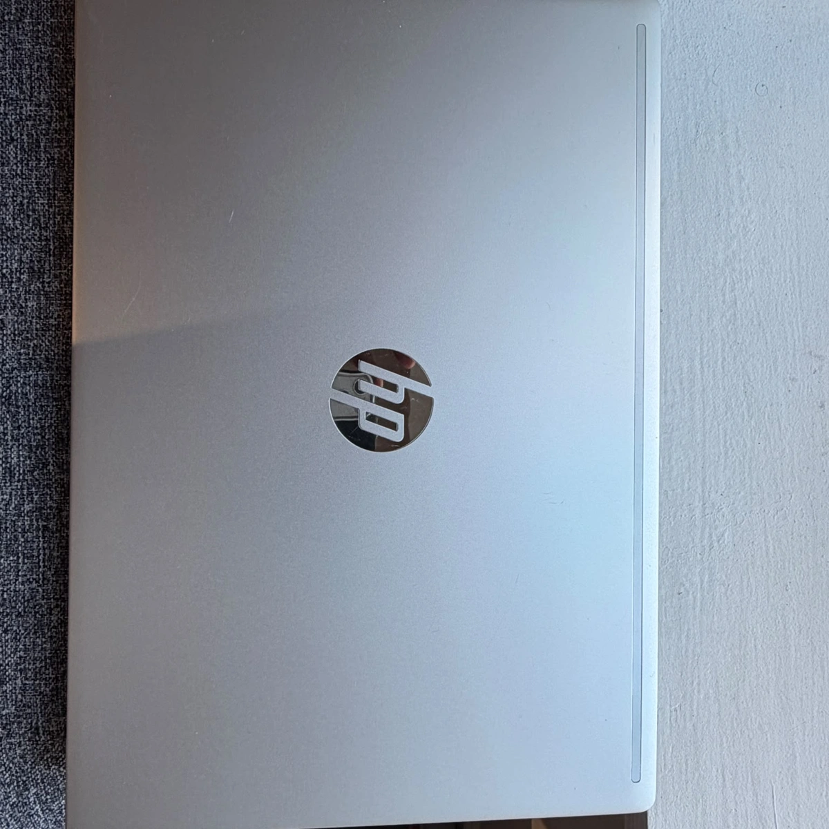 HP ProBook 455 G7 Laptop silver back cover with HP logo